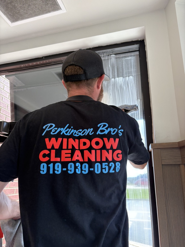 Perkinson Bros cleaning residential windows